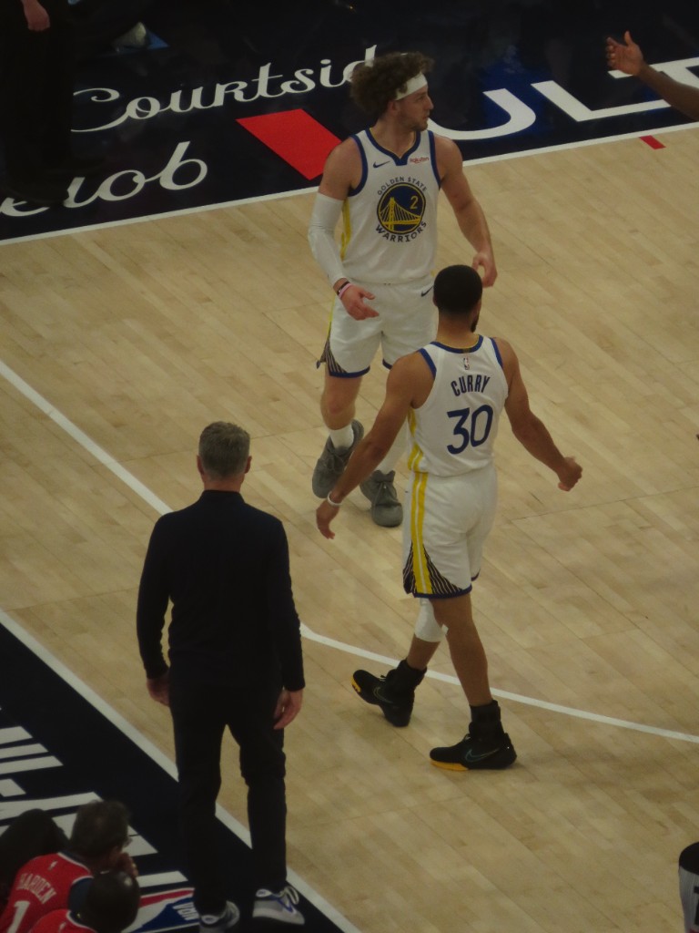 Stephen Curry and Brandin Podziemski